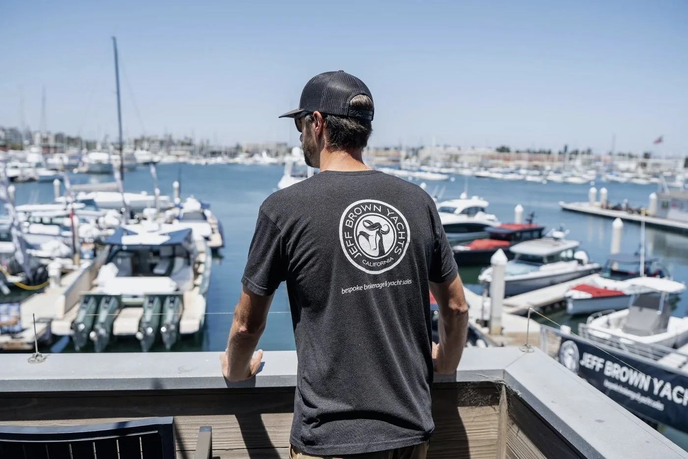 A Jeff Brown Yachts technician inspecting a drive